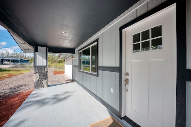 doorway to property featuring a patio area