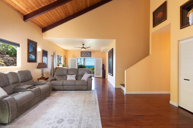 living room featuring ceiling fan, a healthy amount of sunlight, and high vaulted ceiling