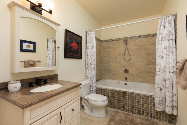 full bathroom featuring vanity, toilet, and shower / tub combo