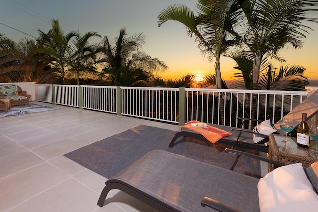 view of patio terrace at dusk