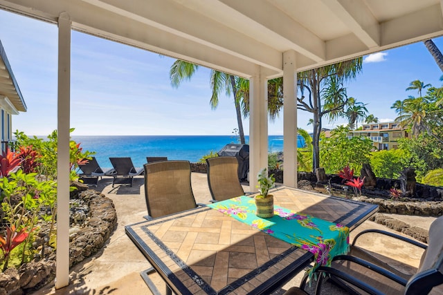 view of patio / terrace featuring a water view