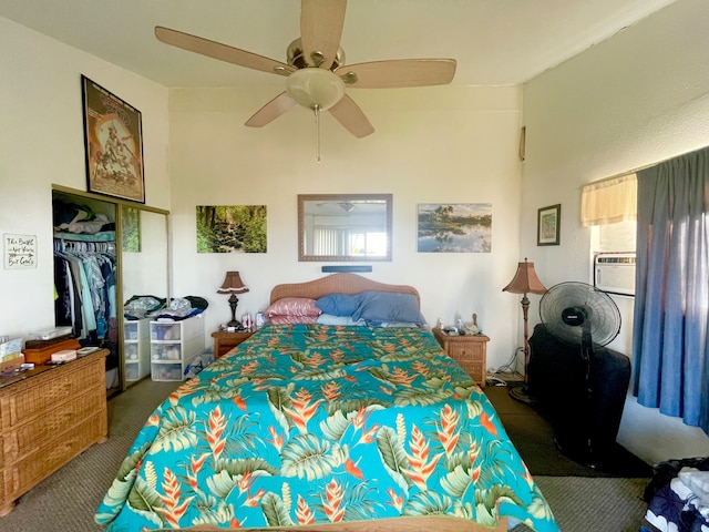 bedroom with cooling unit, a closet, dark carpet, and ceiling fan