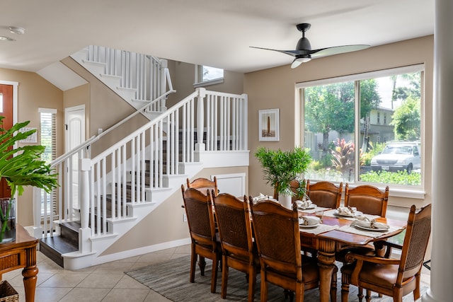 dining room featuring ceiling fan and light tile patterned flooring