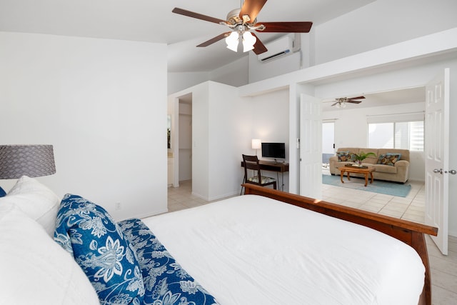 tiled bedroom with an AC wall unit and ceiling fan