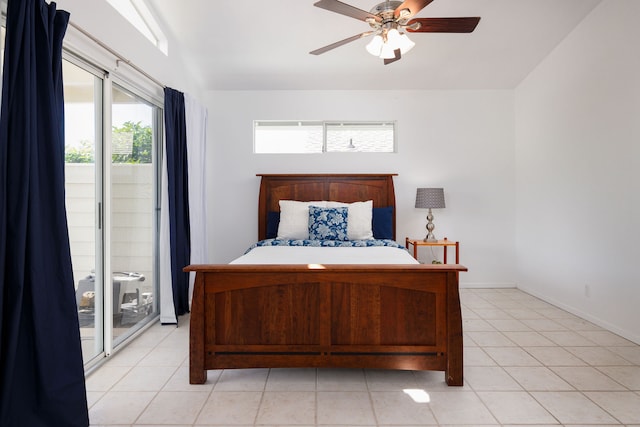 bedroom featuring access to exterior, light tile patterned floors, and ceiling fan