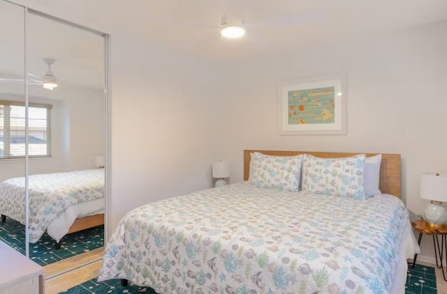 bedroom featuring a closet and ceiling fan