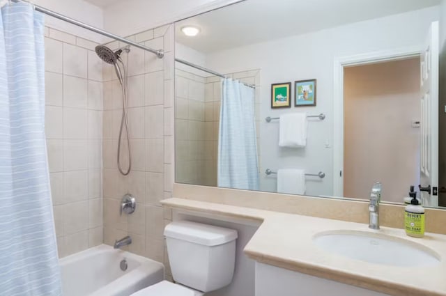 full bathroom with vanity, toilet, and shower / bathtub combination with curtain