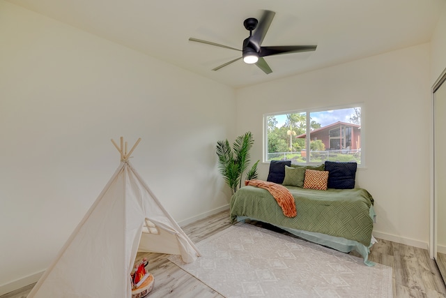 bedroom featuring ceiling fan and wood-type flooring