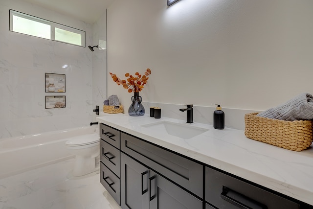 full bathroom featuring vanity, toilet, and tiled shower / bath