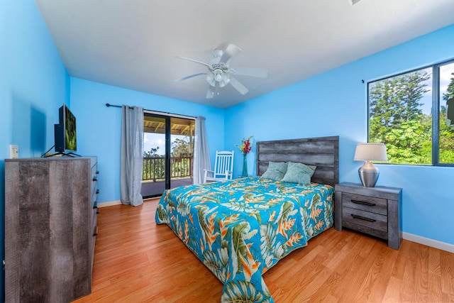 bedroom with access to outside, light hardwood / wood-style floors, and ceiling fan