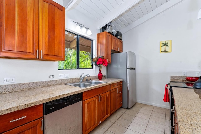 kitchen featuring wooden ceiling, sink, vaulted ceiling with beams, appliances with stainless steel finishes, and light stone counters