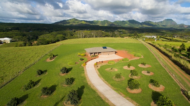 aerial view with a mountain view and a rural view