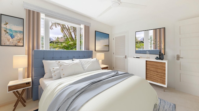 carpeted bedroom with multiple windows, ceiling fan, and a closet