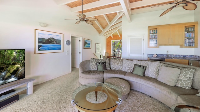 living room with light colored carpet, sink, beam ceiling, high vaulted ceiling, and wooden ceiling