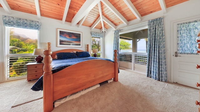 carpeted bedroom with wood ceiling, multiple windows, and lofted ceiling with beams