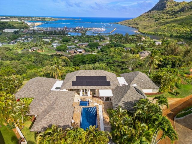 birds eye view of property featuring a water view