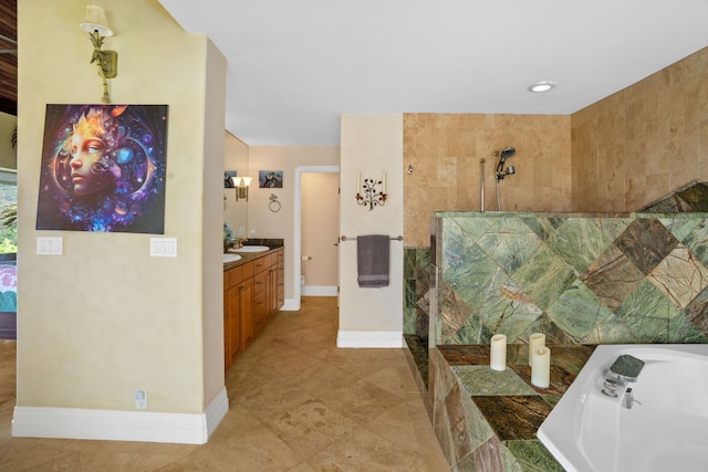 bathroom with tile patterned flooring, vanity, and separate shower and tub