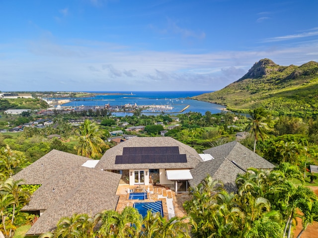 bird's eye view with a water view