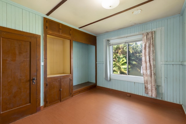 unfurnished bedroom featuring light wood finished floors and a closet