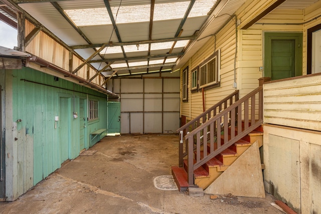 garage featuring metal wall