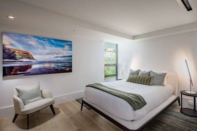 bedroom featuring wood-type flooring