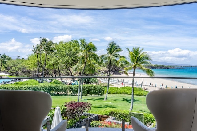 balcony with a beach view and a water view