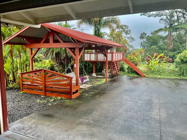 view of home's community featuring a deck and a gazebo