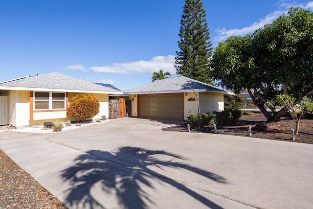 ranch-style home with a garage