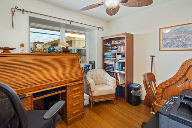 office with ceiling fan, washer / dryer, and light wood-type flooring