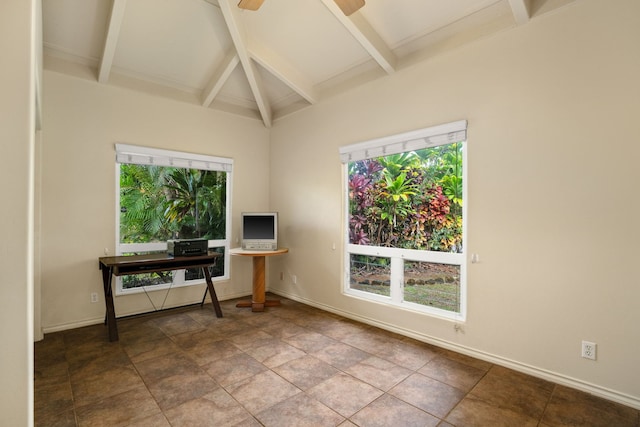 unfurnished office with tile patterned flooring and vaulted ceiling with beams