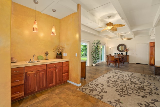 interior space featuring beamed ceiling, ceiling fan, vanity, coffered ceiling, and tile patterned floors