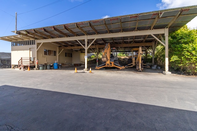 view of parking featuring a carport