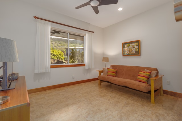 living room with ceiling fan