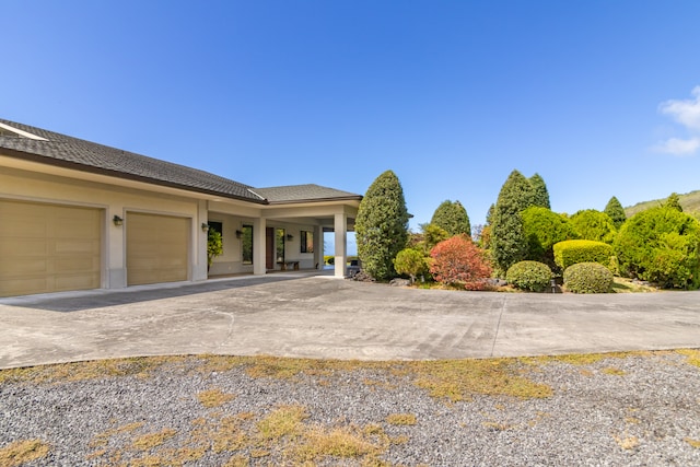 exterior space with a garage