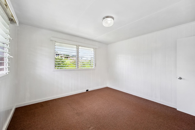 spare room featuring carpet flooring