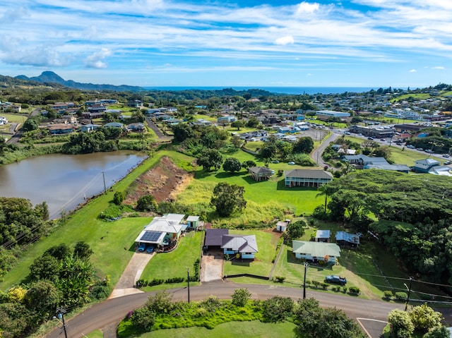 drone / aerial view with a water view