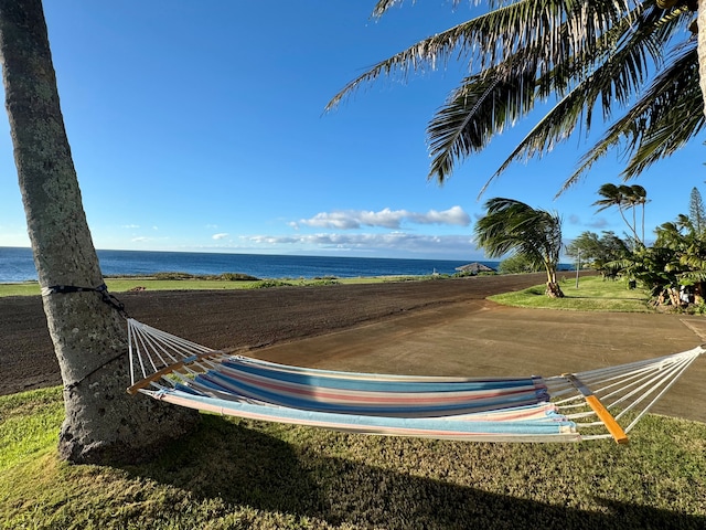 exterior space with a water view