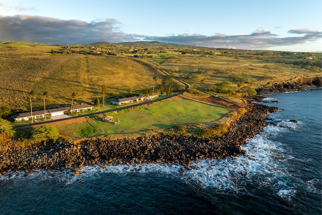 aerial view with a rural view and a water view