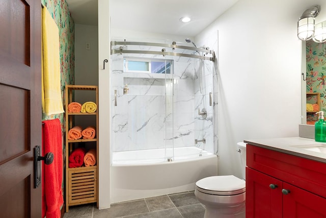 full bathroom with shower / bath combination with glass door, vanity, and toilet