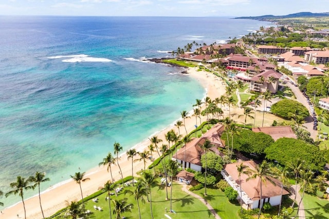 bird's eye view featuring a beach view and a water view