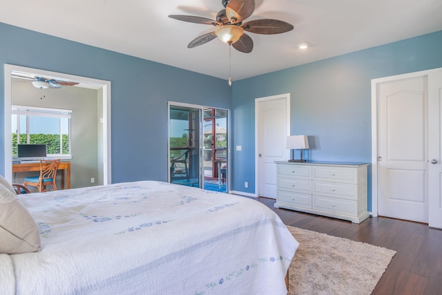 bedroom with access to exterior, dark hardwood / wood-style floors, and ceiling fan