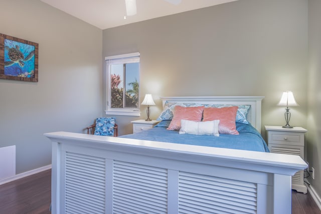 bedroom featuring ceiling fan and dark hardwood / wood-style flooring