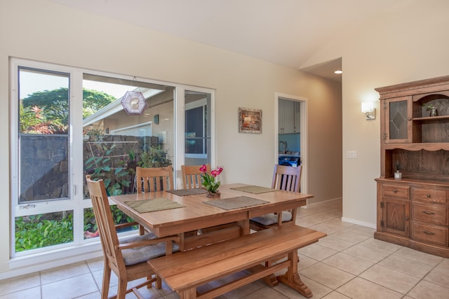 dining room featuring light tile patterned flooring