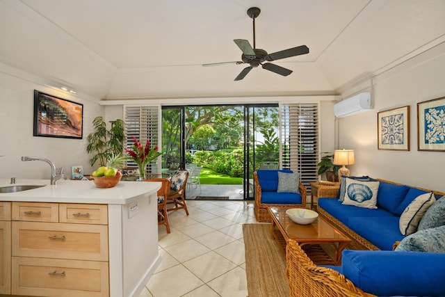 living room featuring ceiling fan, sink, a wall unit AC, light tile patterned floors, and ornamental molding