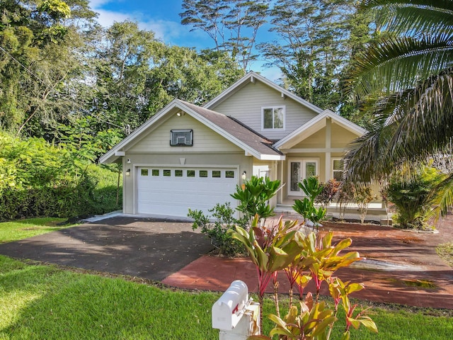 view of front of house with french doors and a garage