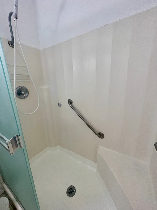 bathroom featuring walk in shower