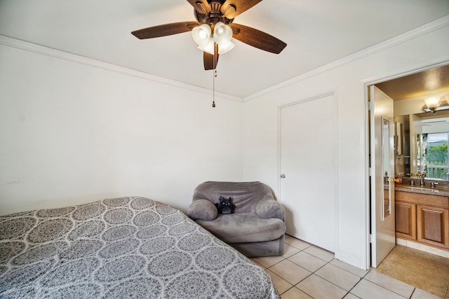 bedroom with ensuite bath, ceiling fan, crown molding, sink, and light tile patterned floors