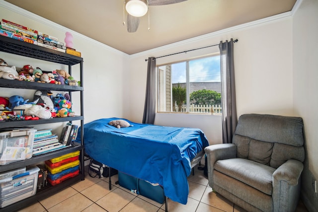 bedroom featuring ceiling fan, crown molding, and light tile patterned flooring