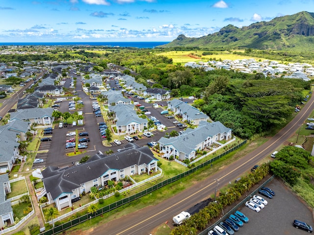 birds eye view of property featuring a mountain view