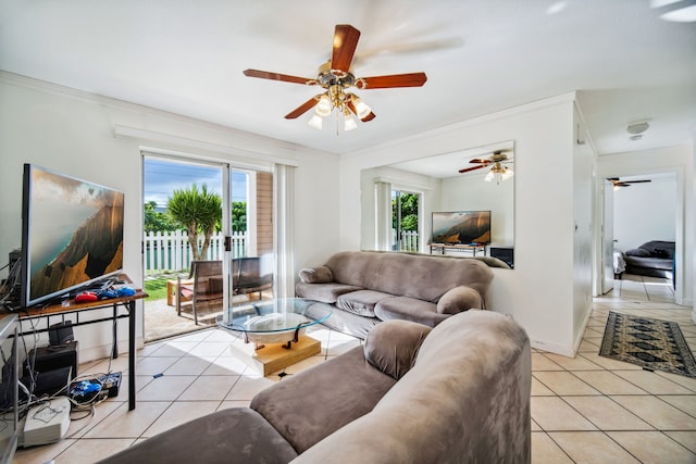 living room with ornamental molding, a healthy amount of sunlight, and light tile patterned flooring